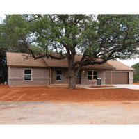Finished home built on a house pad prepared by Scott Construction & Excavation