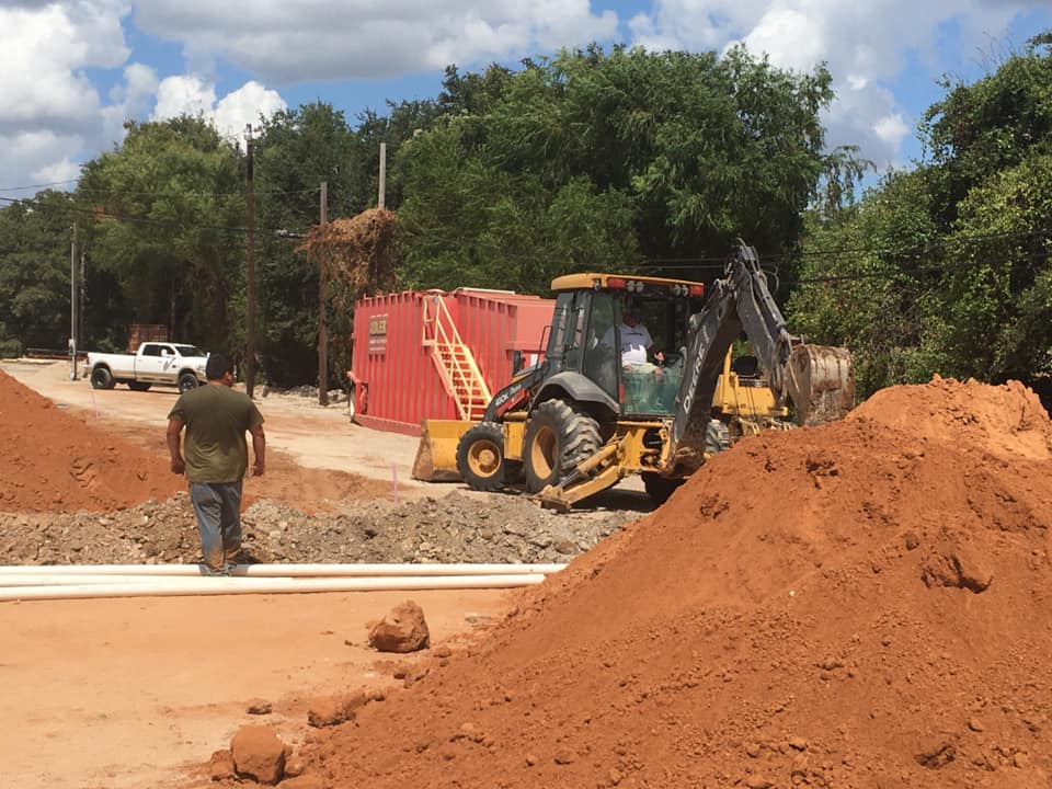 Site clearing and grading in progress ahead of house pad construction near Granbury, TX